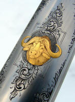 Dakota 76 with gold damascened Cape Buffalo with large scroll